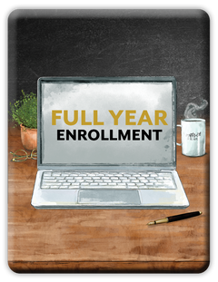 Laptop on a desk with 'Full Year Enrollment' text on the screen, mug, and pen.